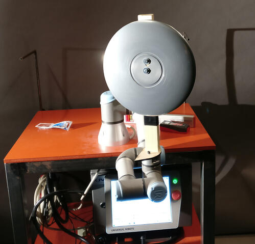 Robotic arm rotation platform for capturing images from different orientations